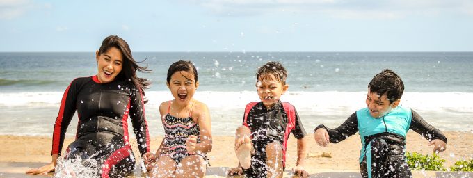 kids playing on the beach